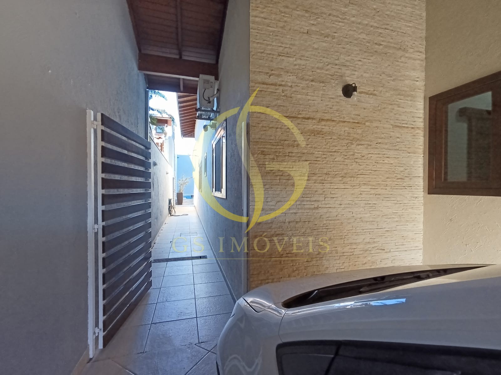 Casa à venda no bairro Indaiá em Caraguatatuba, SP com 3 dormitórios sendo 2 suítes, piscina - Foto 4